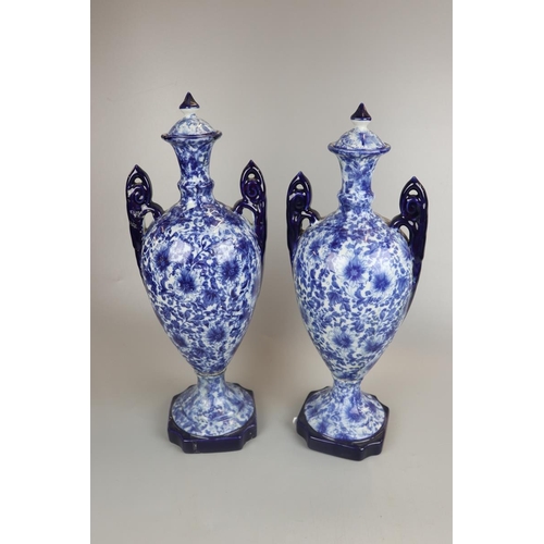 91 - Pair of blue and white Victoria Ironstone urns - Approx height: 47cm