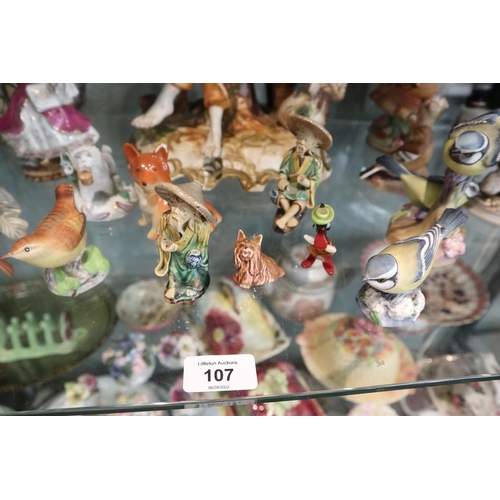 107 - Collection of ceramic figures