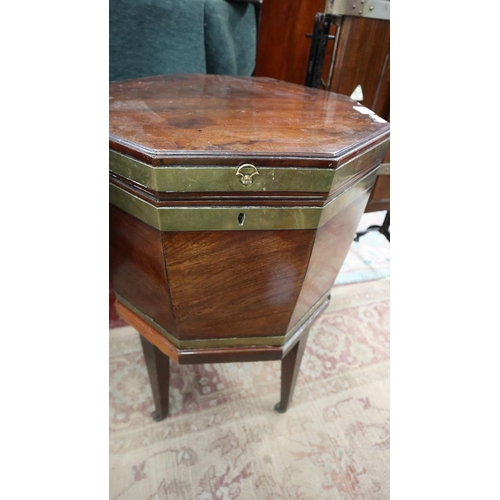 184 - Antique mahogany brass bound cellarette on stand