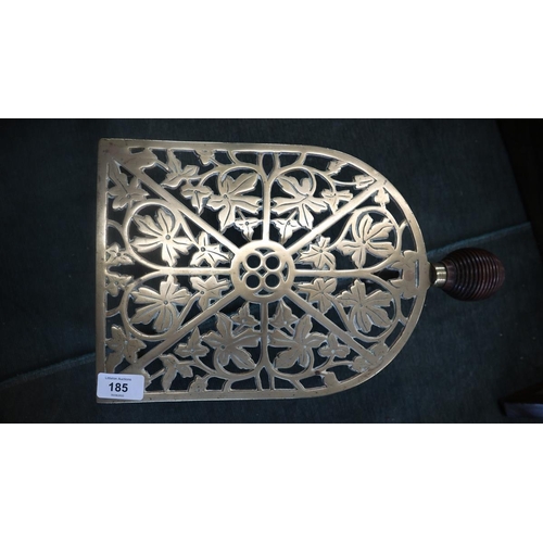 185 - Brass trivet and spit jack bracket