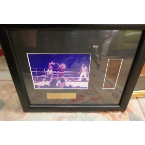 238 - Signed Muhammad Ali L/E print 58/100 with C.O.A together with a framed film cell of the Muhammad Ali... 