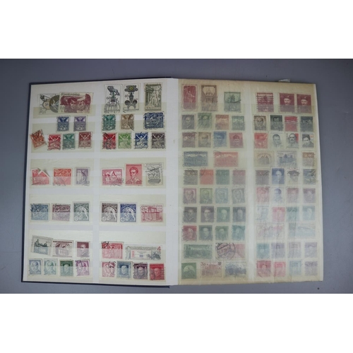 86 - 3 stamp albums and a collection of loose postcards