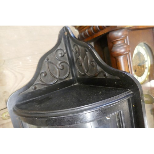 199 - Small ebonised corner display cupboard