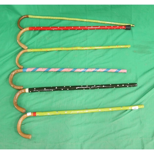 241 - 6 Circus clowns, painted walking sticks - ex Jerry Cottles Circus