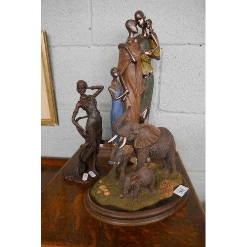 289 - Masai figurines together with family of elephants - Approx height of tallest: 45cm