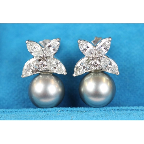 34 - Fine pair of 18ct white gold earrings set with marquise diamonds & pearls