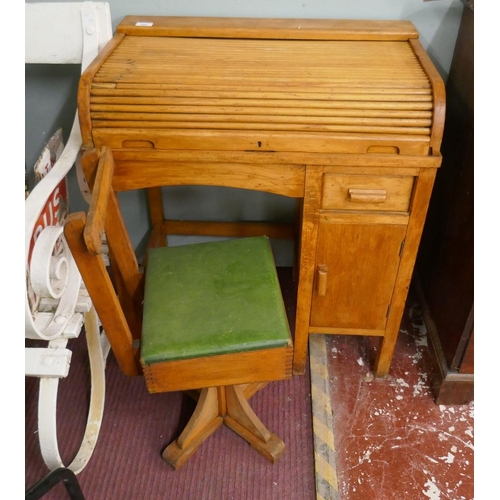 342 - Beechwood tambour top children's desk together with matching swivel chair - Approx: W: 70cm D: 44cm ... 