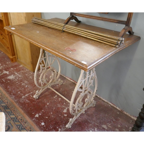 399 - Small wooden table with cast iron base