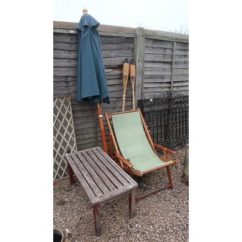 486 - Deckchair parasol and a small teak table