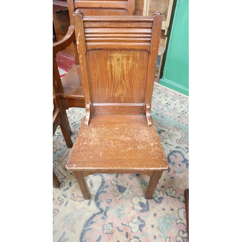 294 - 3 Gothic style pitch pine chairs