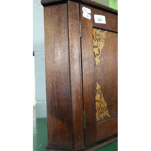 297 - Small oak corner cupboard