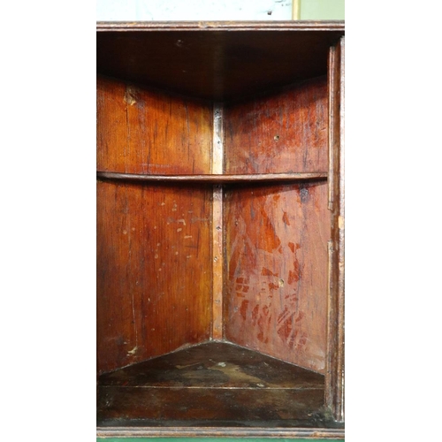 297 - Small oak corner cupboard