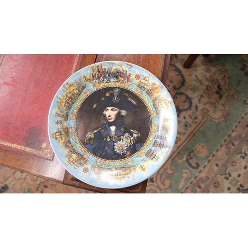 306 - Framed picture of Napoleon together with Lord Nelson commemorative plate