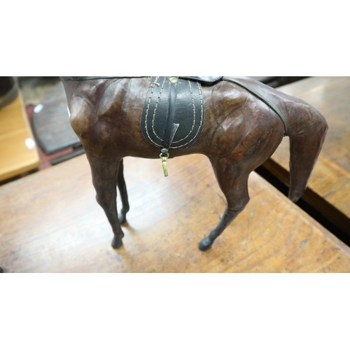 334 - 2 Liberty style leather model horses - Approx height of tallest: 35cm