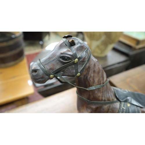 334 - 2 Liberty style leather model horses - Approx height of tallest: 35cm