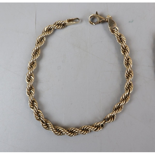 35 - Pair of gold bracelets - Approx weight 21.4g