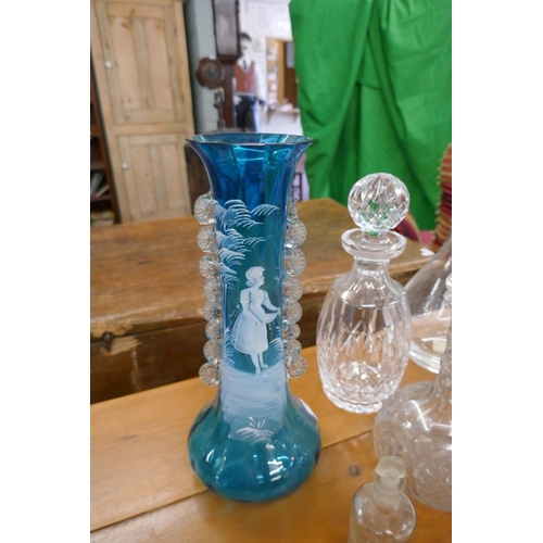 361 - Collection of decanters together with a blue and white vase