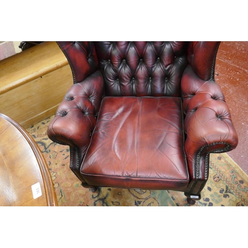 364 - 2 oxblood red leather armchairs