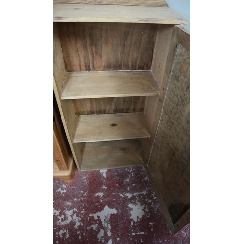 395 - Small pine cupboard