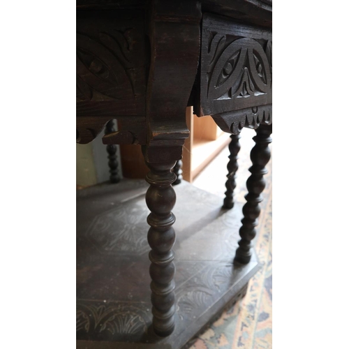 408 - Carved oak 2 tier octagonal centre table