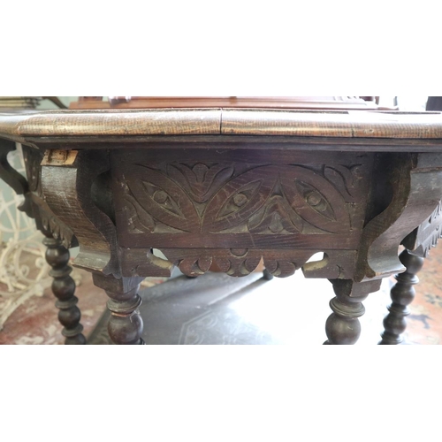 408 - Carved oak 2 tier octagonal centre table