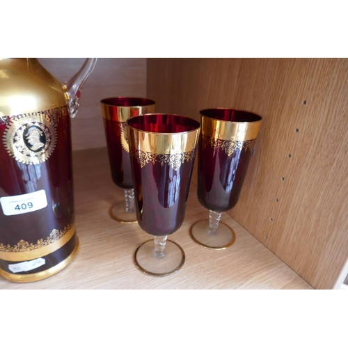 409 - Gilt cranberry glass lemonade set for 6