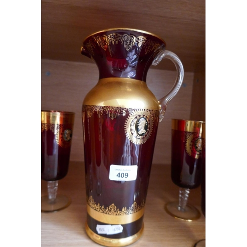 409 - Gilt cranberry glass lemonade set for 6