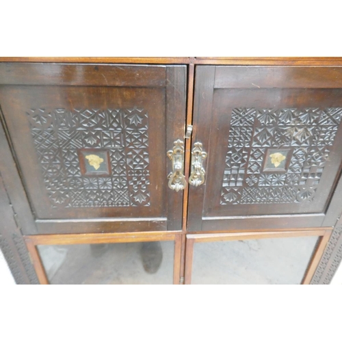 419 - Oriental themed corner cabinet with well carved panels