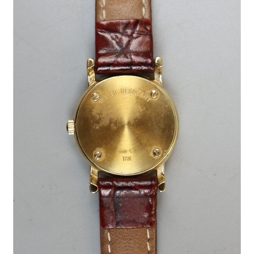 69 - 18ct gold cased Tissot watch with C.O.A