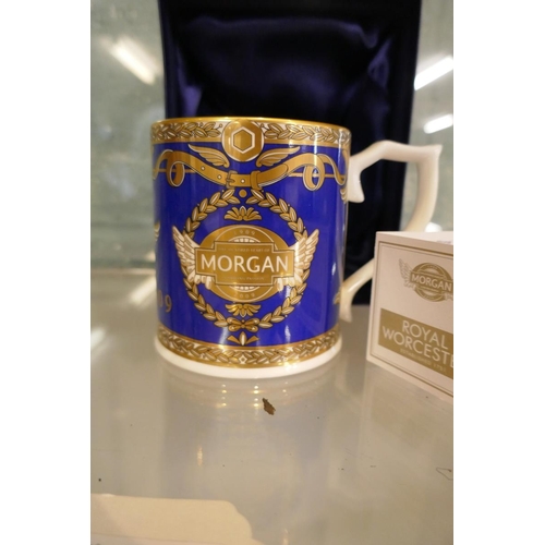 124 - Porcelain mug commemorating the centenary of the Morgan Motor Co. Ltd, of Malvern 1909-2009 in prese... 