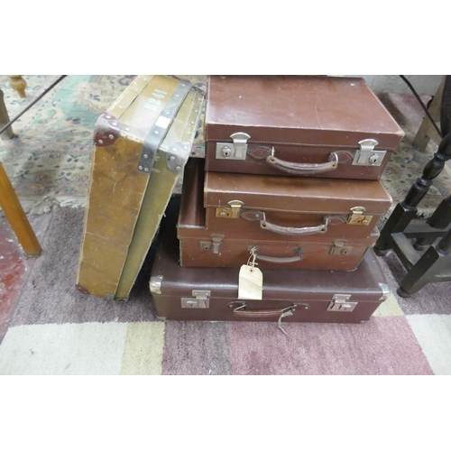 179 - 4 vintage suitcases and a vintage laundry box