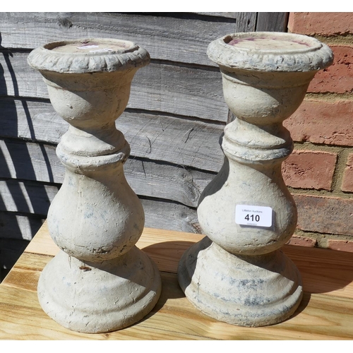 410 - Pair of glazed terracotta candlesticks