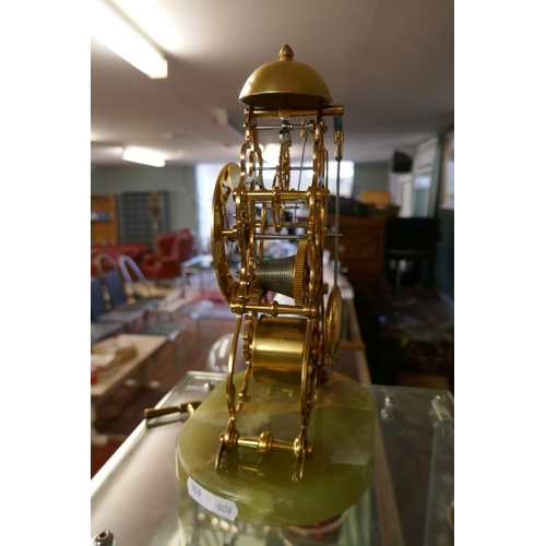 70 - Skeleton clock under glass dome on onyx base - Approx height: 32cm