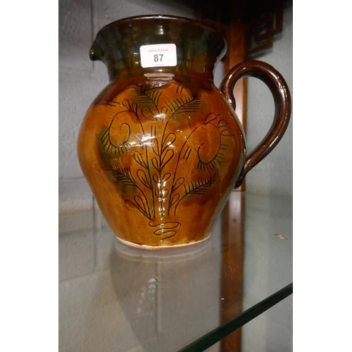 87 - Large studio pottery jug with treacle glaze - Approx height: 25cm