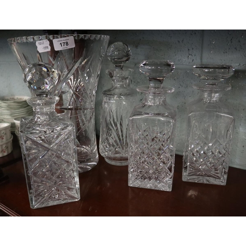 178 - 4 cut glass decanters together with large vase