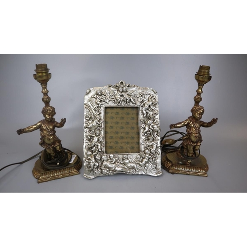 185 - Pair of antique cherub lamps together with photo frame