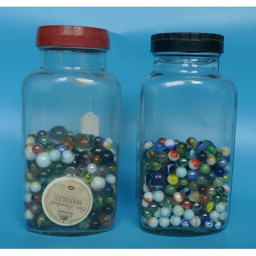 218 - 2 jars of vintage marbles