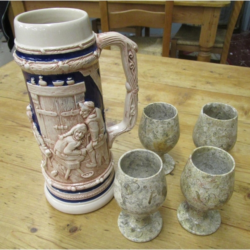 276 - Four marble goblets together with large tankard