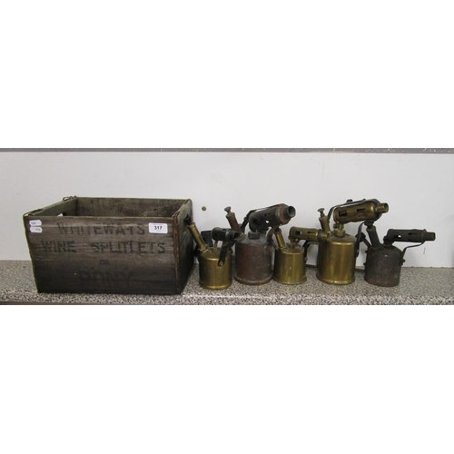 317 - 5 brass blow lamps and wooden box