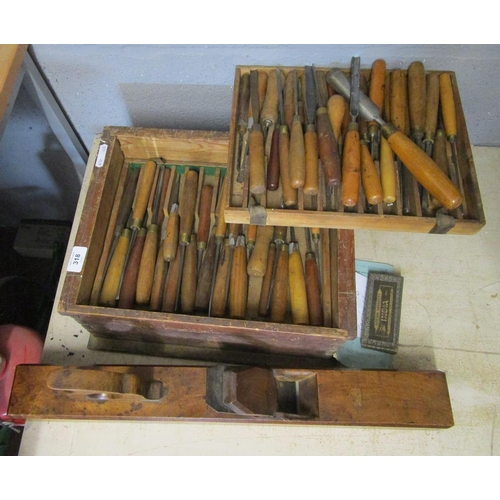 318 - Approx 70 chisels and a wood plane