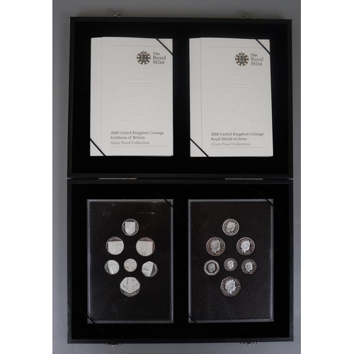 78 - Two sets of silver proof 2008 British coins emblems of Britain's and Royal Shield of Arms in case wi... 