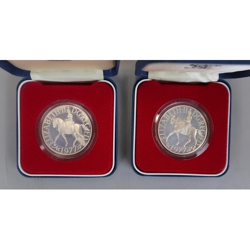 84 - Two silver-proof 1977 silver jubilee coins with C.O.A's