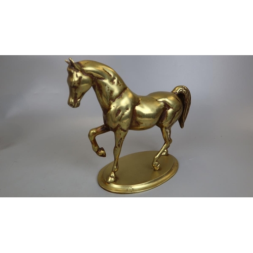 127 - Brass horse figurine together with a metal horse figurine