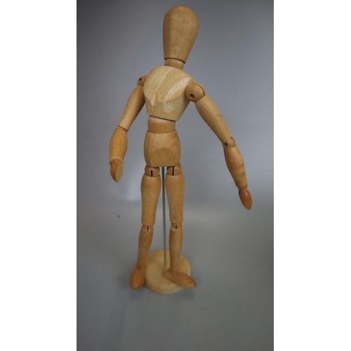 170 - 2 articulated wooden models together with an Egyptian figurine