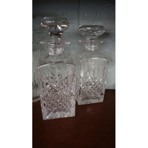 178 - 4 cut glass decanters together with large vase