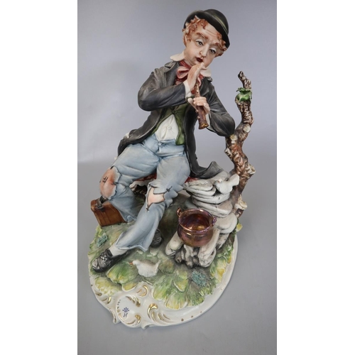 184 - Capodimonte figurine together with a Royal Worcester boy figurine