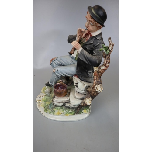 184 - Capodimonte figurine together with a Royal Worcester boy figurine