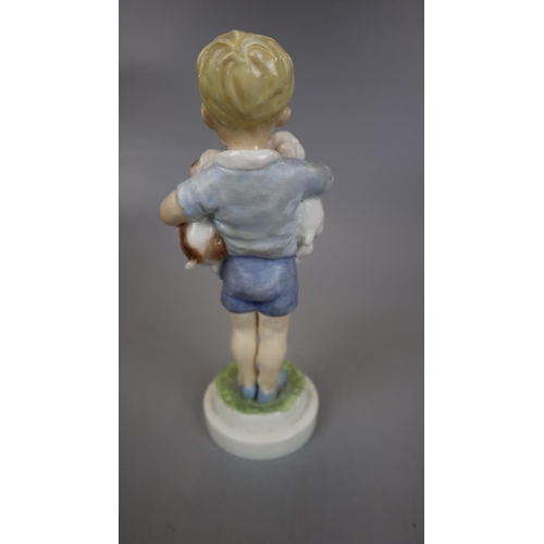 184 - Capodimonte figurine together with a Royal Worcester boy figurine