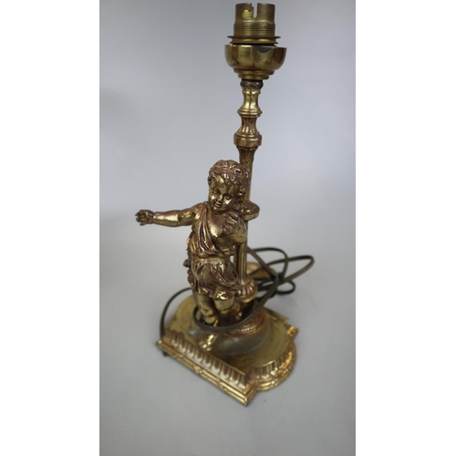 185 - Pair of antique cherub lamps together with photo frame