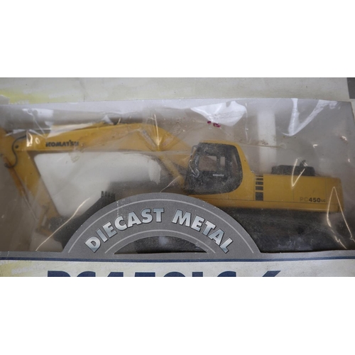 257 - 2 die cast excavators and die cast bull dozer